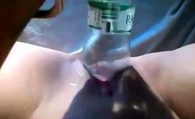 naughty-amateur-chick-buries-a-bottle-inside-her-pussy