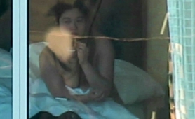 Voyeur Spies On A Beautiful Oriental Babe With Lovely Tits