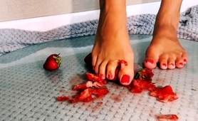amateur-femdom-mistress-crushing-strawberries-barefoot