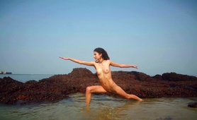 Hot Teen Stripping Seductively And Posing Naked On The Beach
