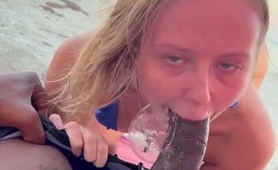 horny-milf-sucks-and-fucks-big-black-cock-on-the-beach
