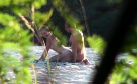 voyeur-captures-amateur-couple-having-sex-on-the-beach